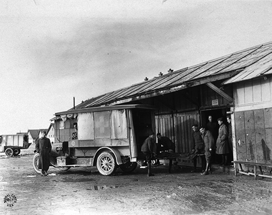 Close-up view, unloading ambulances at Receiving Ward.