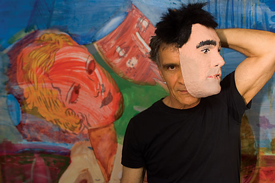 Gerald Donato standing in front of Untitled (Mask), 1987